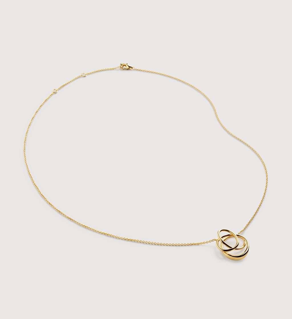 Infinite gold pendant