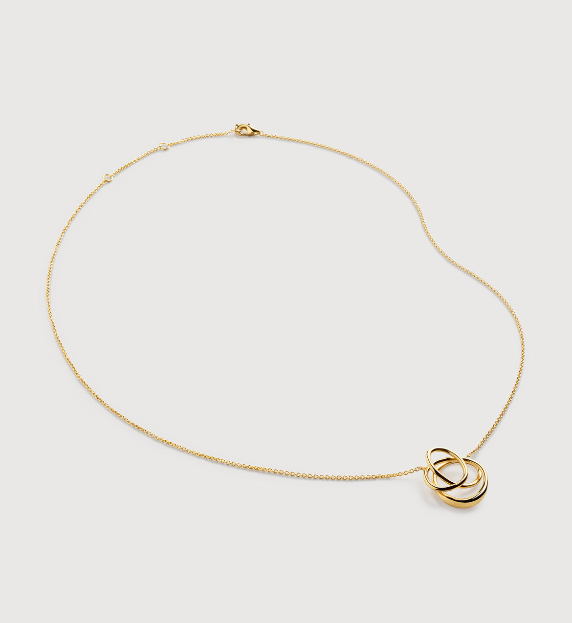 Infinite gold pendant